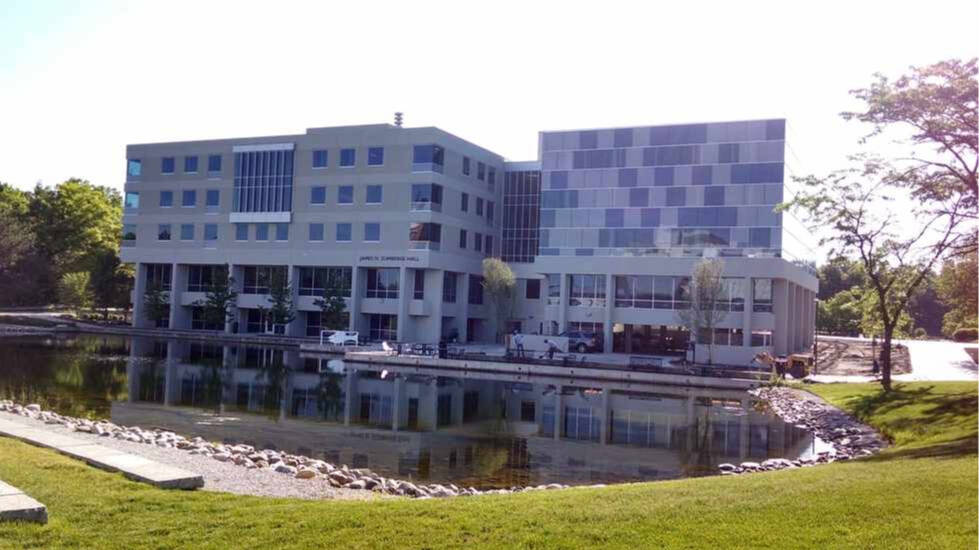 Zumberge Hall with view of pond